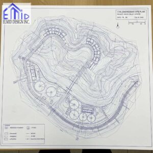Civil engineering drawings Newmarket site plan showing grading contours, roadway layout, drainage routes, and utility design for hillside development.
